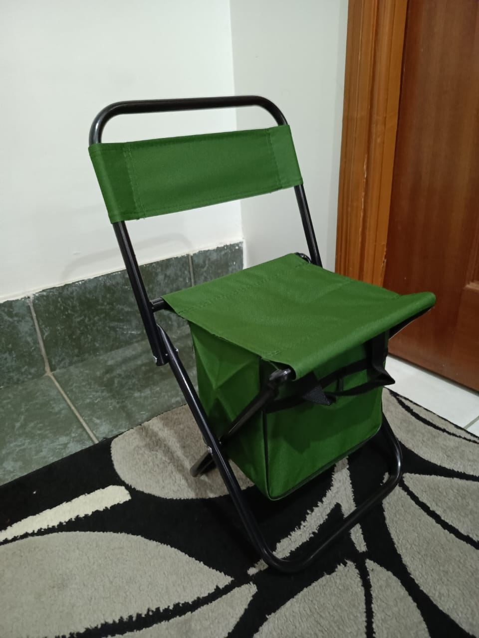Foldable camping chair with storage pouch