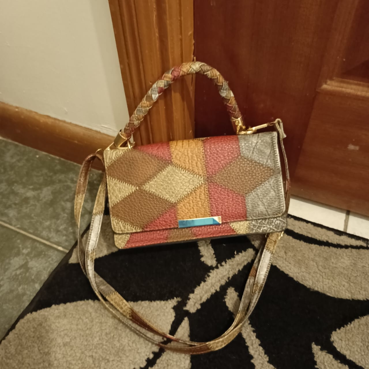 Fashionable multicolored diamond sling bag
