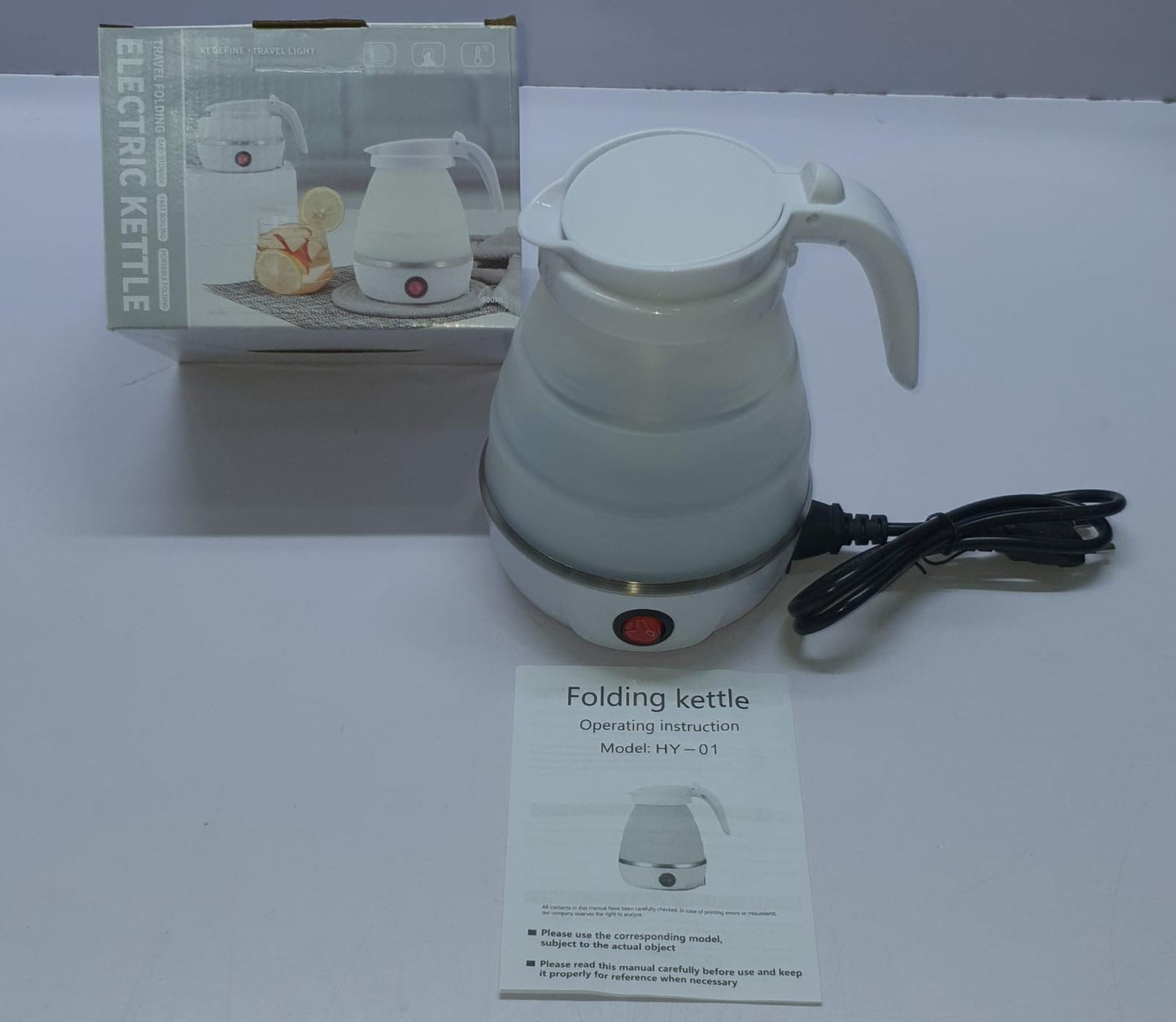 Foldable electric kettle with silicone body