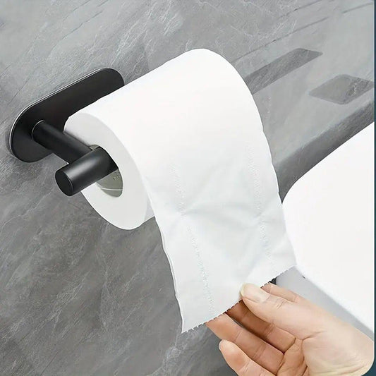 Adhesive toilet tissue holder