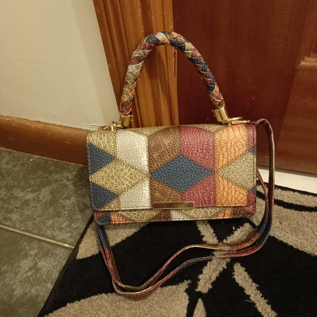 Fashionable multicolored diamond sling bag